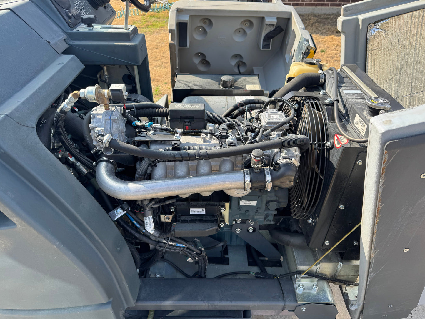 Advance Refurbished Advance SW8000 | 77" Ride-On Propane Sweeper | Dual Side Brushes | Trio-Sweeper Dust Guard | 2022